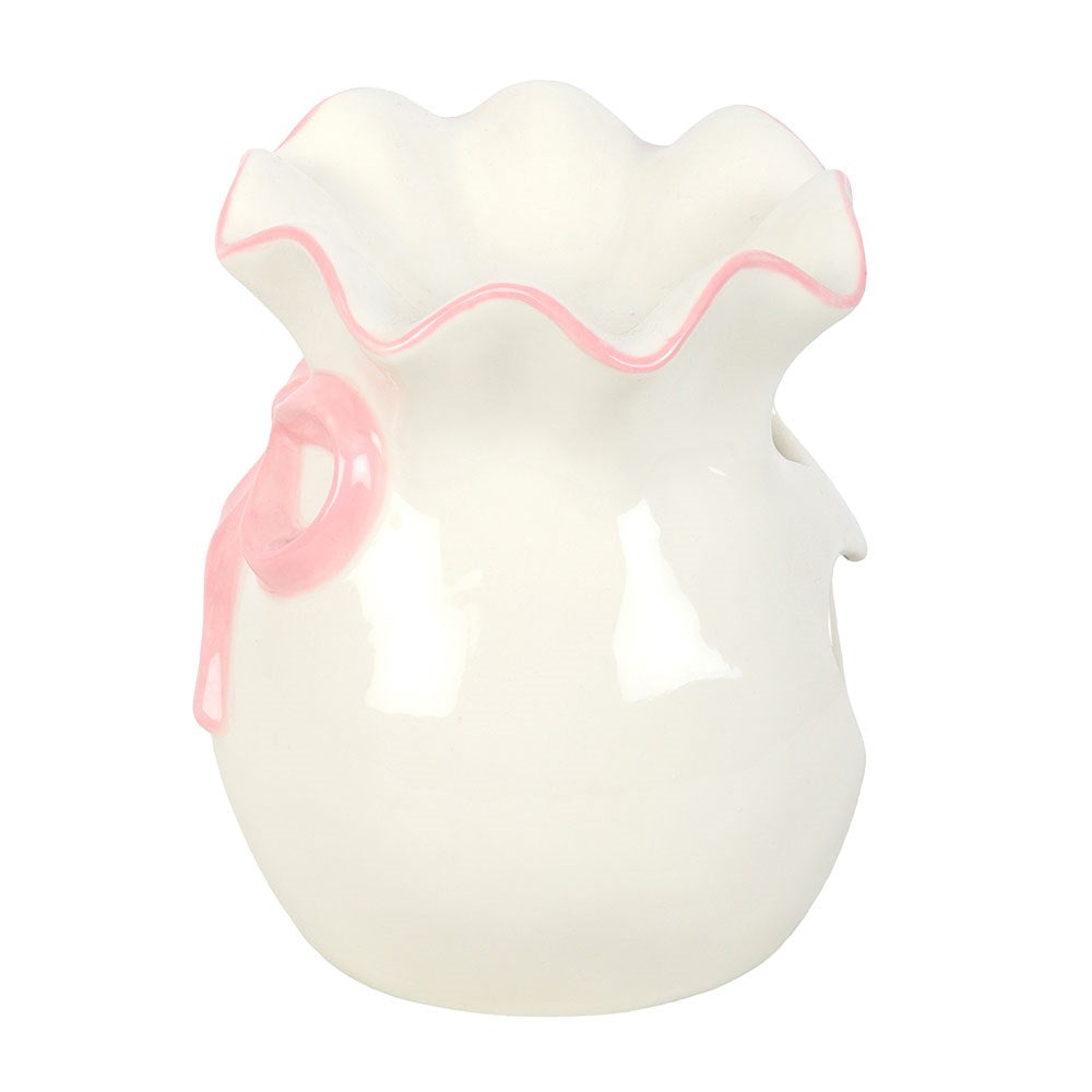 White and pink bow burner